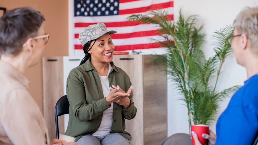 Female veteran talking to group